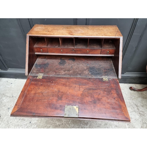 1014 - A small George III mahogany bureau, 76cm wide. 