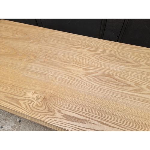 1018 - A 'Jual Retro' plywood coffee table, 151cm wide. 