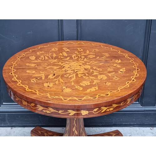 1022 - A Dutch walnut and marquetry circular pedestal table, 79.5cm diameter. 