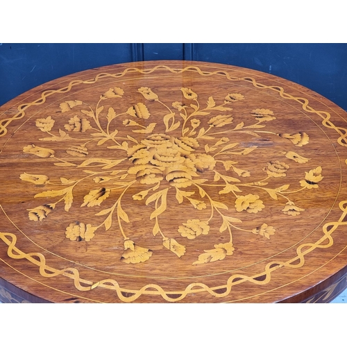 1022 - A Dutch walnut and marquetry circular pedestal table, 79.5cm diameter. 