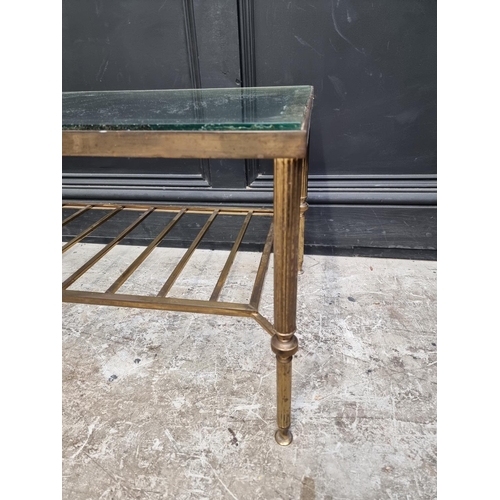 1026 - A vintage brass and glass topped rectangular low occasional table, 92cm wide.