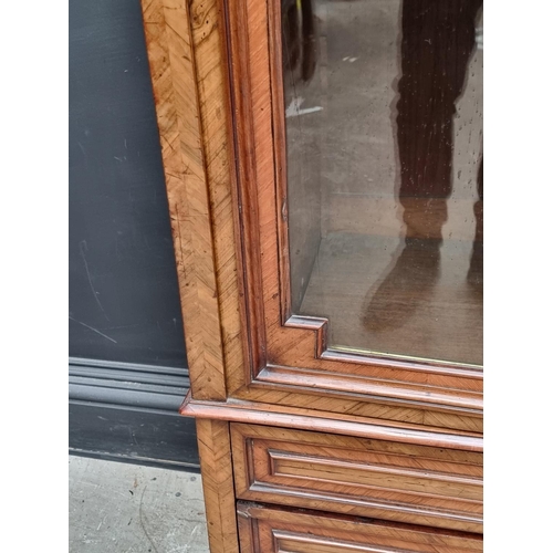 1031 - A late 19th century Continental walnut bookcase, 90cm wide.