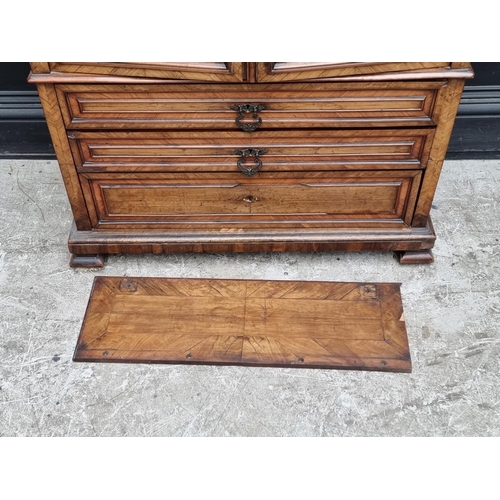 1031 - A late 19th century Continental walnut bookcase, 90cm wide.