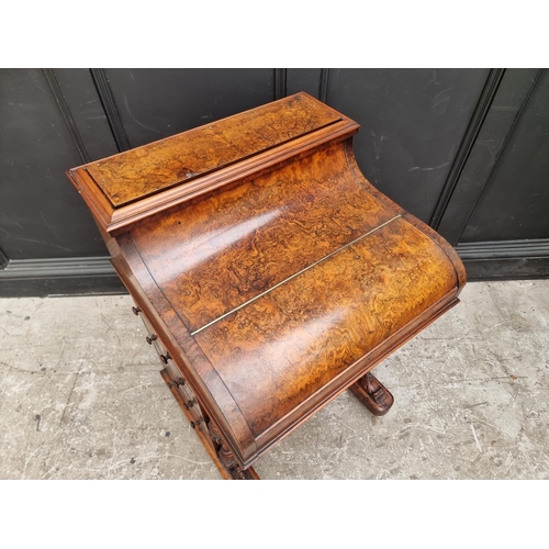 1037 - A Victorian figured walnut piano top Davenport, 58cm wide.