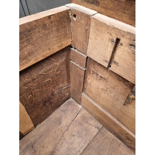 1051 - A late 17th century panelled oak and parquetry mule chest, 129.5cm wide. 