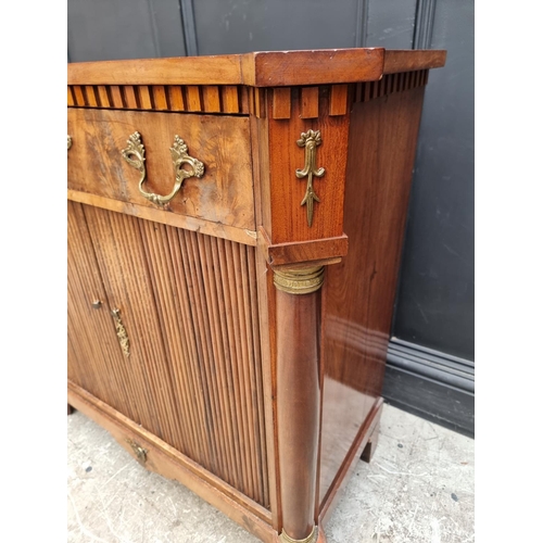 1063 - An early 19th century Continental mahogany side cabinet, 92.5cm wide, (alterations). ... 