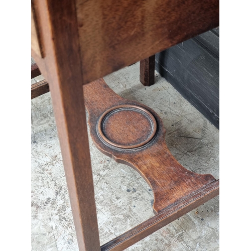 1064 - Two similar Georgian mahogany shaving stands, largest 34.5cm wide. (2)