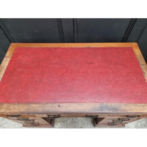 1068 - A circa 1900 mahogany pedestal desk, 107.5cm wide.