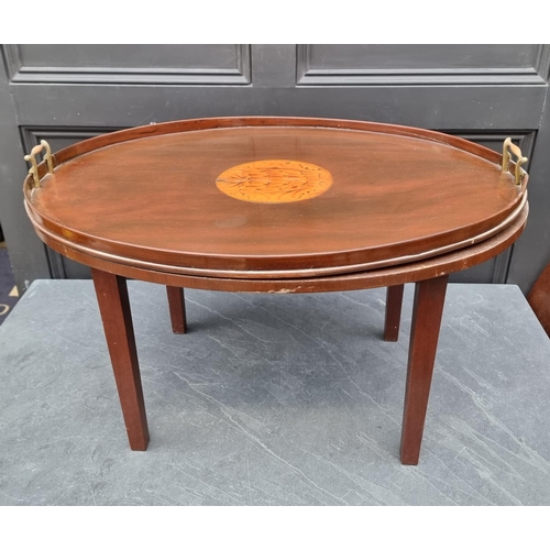 1069 - A late Victorian mahogany and inlaid twin handled oval gallery tray, 78cm wide, on associated stand.... 