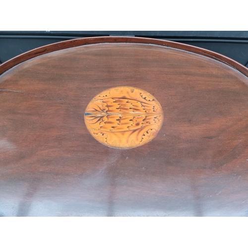 1069 - A late Victorian mahogany and inlaid twin handled oval gallery tray, 78cm wide, on associated stand.... 