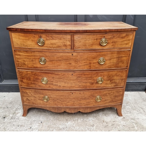 1070 - A George III mahogany bowfront chest of drawers, 117.5cm wide.