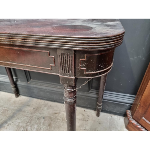 1072 - A late George III mahogany tea table, with double gateleg action, 91cm wide.  ... 