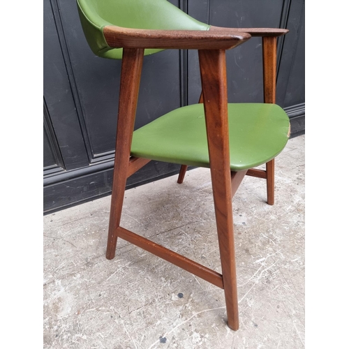 1073 - A vintage teak and green vinyl elbow chair, in the manner of Guilleumas. 