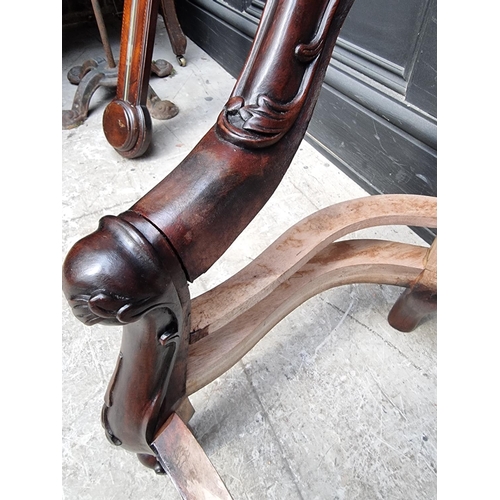 1076 - A Victorian style carved walnut childs' settee, 91cm wide.