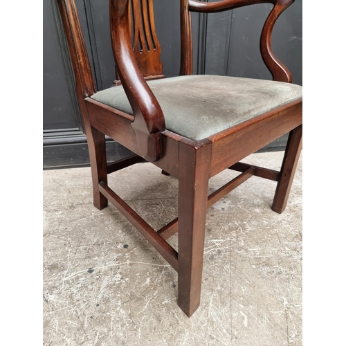 1081 - A George III mahogany elbow chair.