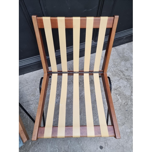 1083 - A pair of 1950s Chevron chairs, by Robin Day. (2)