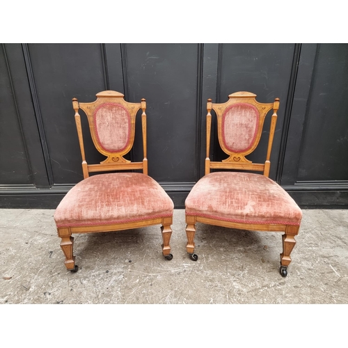 1084 - A pair of late Victorian satinwood and inlaid occasional salon chairs. (2)