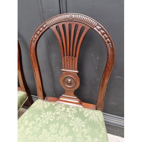 1085 - A pair of George III mahogany dining chairs. (2)