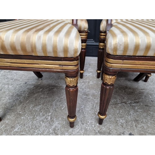 1086 - A set of four George IV faux grained and parcel gilt bar back dining chairs. (4)... 