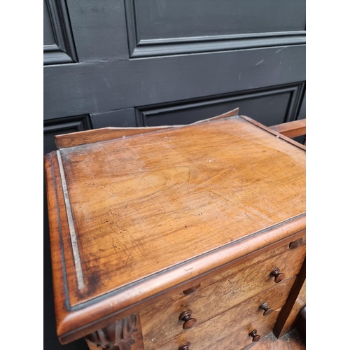 1092 - A Victorian burr walnut Dickens desk, 142.5cm wide.