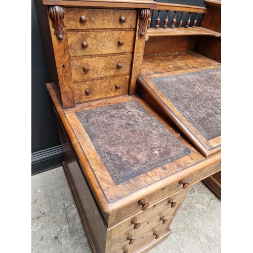 1092 - A Victorian burr walnut Dickens desk, 142.5cm wide.