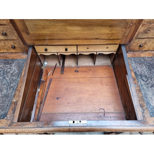 1092 - A Victorian burr walnut Dickens desk, 142.5cm wide.