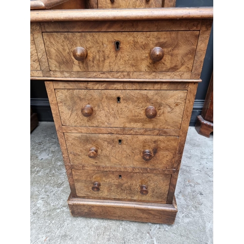 1092 - A Victorian burr walnut Dickens desk, 142.5cm wide.