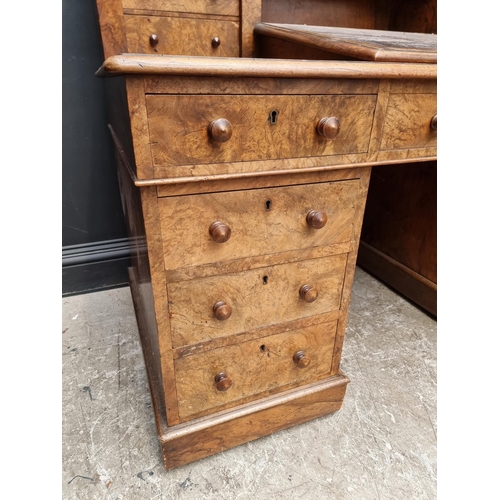 1092 - A Victorian burr walnut Dickens desk, 142.5cm wide.