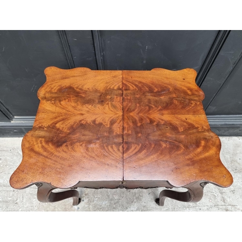 1099 - A 19th century Continental mahogany work table, with sliding top, 57cm wide.