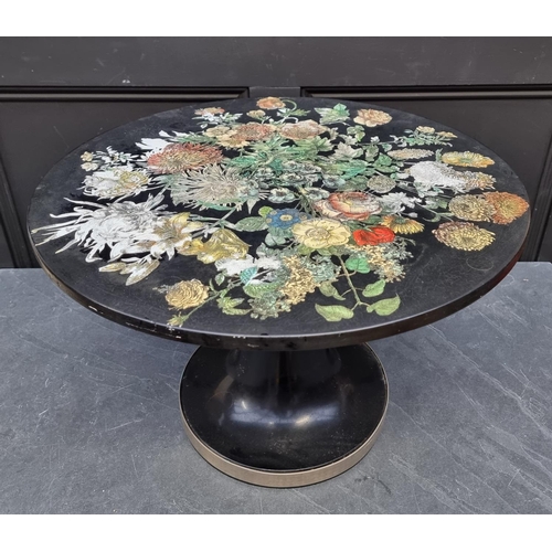 1102 - A vintage Piero Fornasetti 'Fiori' circular occasional table, labelled, 60cm diameter.... 