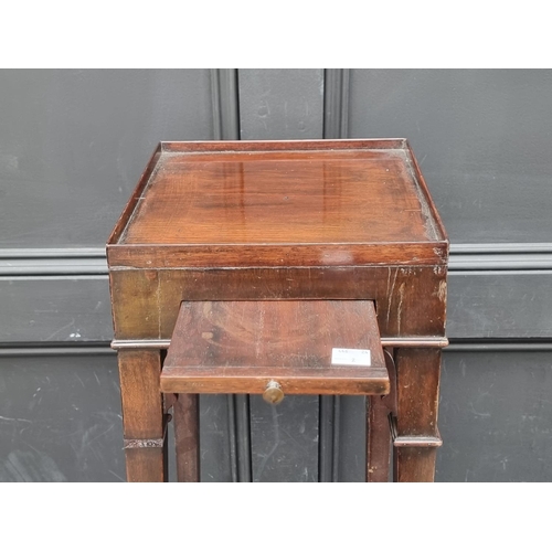 1108 - An antique mahogany urn stand, 24.5cm wide, (faults). 