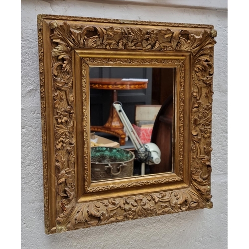 1114 - A gilt framed rectangular wall mirror, 47.5 x 43cm.