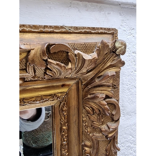 1114 - A gilt framed rectangular wall mirror, 47.5 x 43cm.