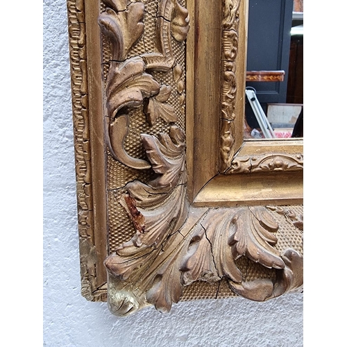 1114 - A gilt framed rectangular wall mirror, 47.5 x 43cm.