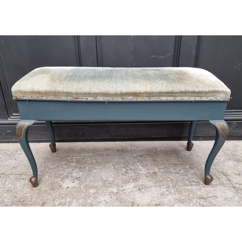 1121 - A blue and gilt painted duet stool, with hinged seat, 93cm wide.