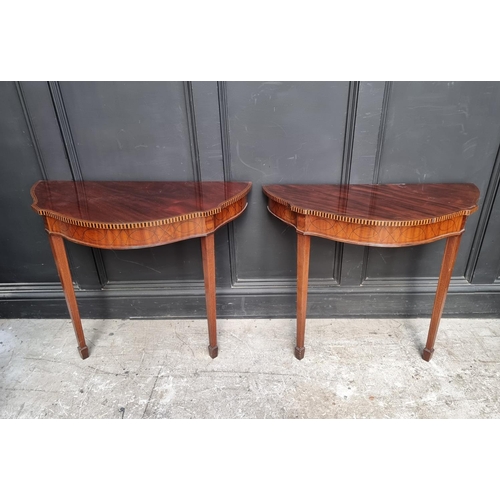 1123 - A pair of early 20th century mahogany and inlaid console tables, 80cm wide. 