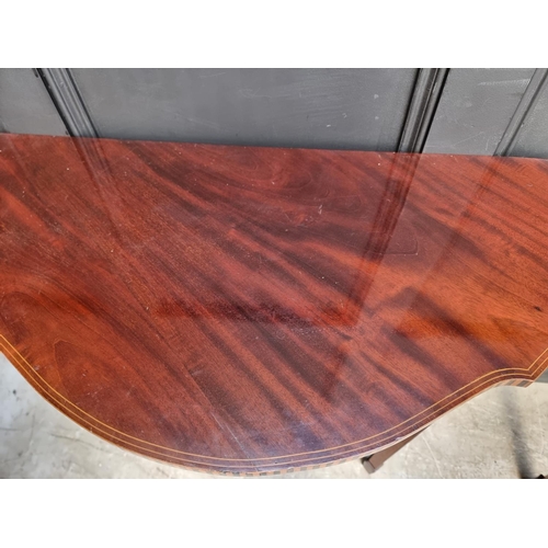 1123 - A pair of early 20th century mahogany and inlaid console tables, 80cm wide. 