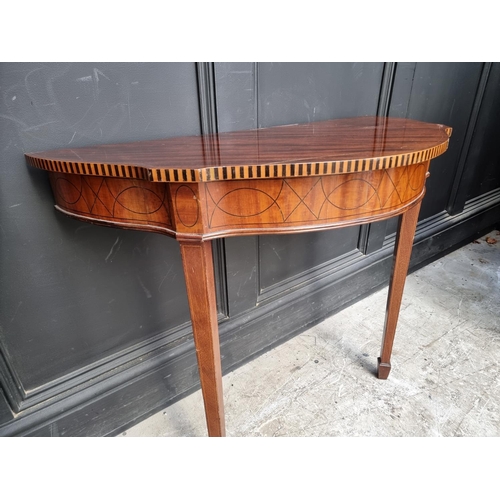 1123 - A pair of early 20th century mahogany and inlaid console tables, 80cm wide. 