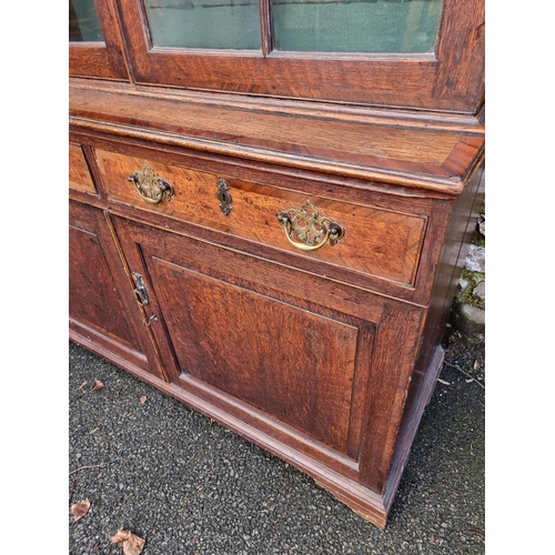 1124 - A George III oak and mahogany bookcase, 126.5cm wide; together with another George III chest of draw... 