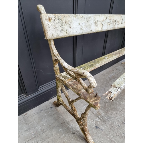 1126 - An old cast iron bench, (a.f.).