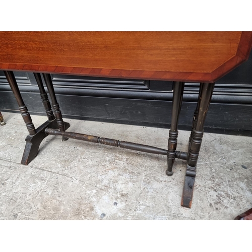 1130 - An Edwardian mahogany Sutherland table, 68.5cm wide; together with a Victorian mahogany tripod table... 