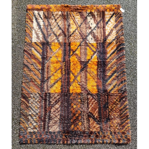 1134 - A Swedish shag pile rug, by Marianne Richter, 196 x 142cm.