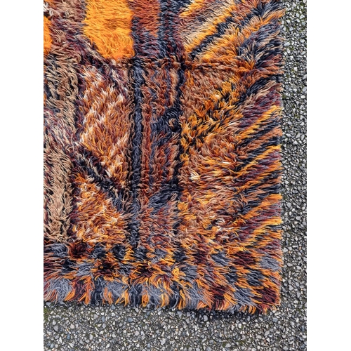 1134 - A Swedish shag pile rug, by Marianne Richter, 196 x 142cm.