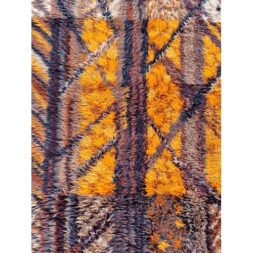 1134 - A Swedish shag pile rug, by Marianne Richter, 196 x 142cm.