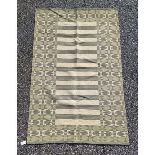 1135 - A Swedish double sided rug, 203 x 132cm.