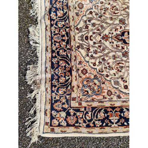 1142 - A Persian rug, having central floral medallion, with floral borders, 202 x 127cm.