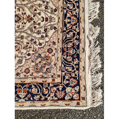 1142 - A Persian rug, having central floral medallion, with floral borders, 202 x 127cm.