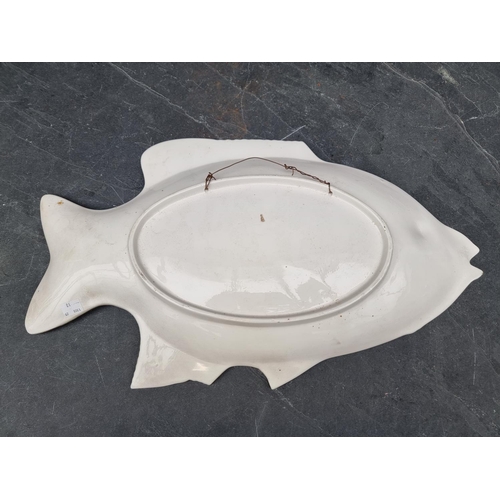 1174 - A pottery fish plate, 57cm wide.