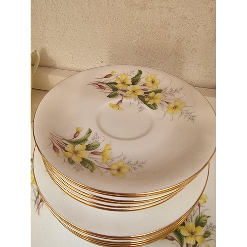 1197 - A Royal Albert 'Lemon Primrose' pattern tea service.