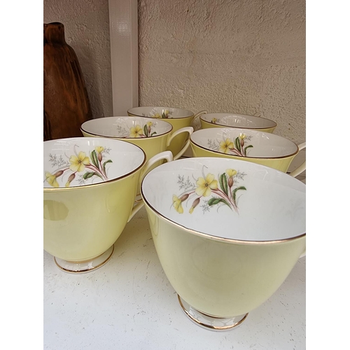 A Royal Albert 'Lemon Primrose' pattern tea service.